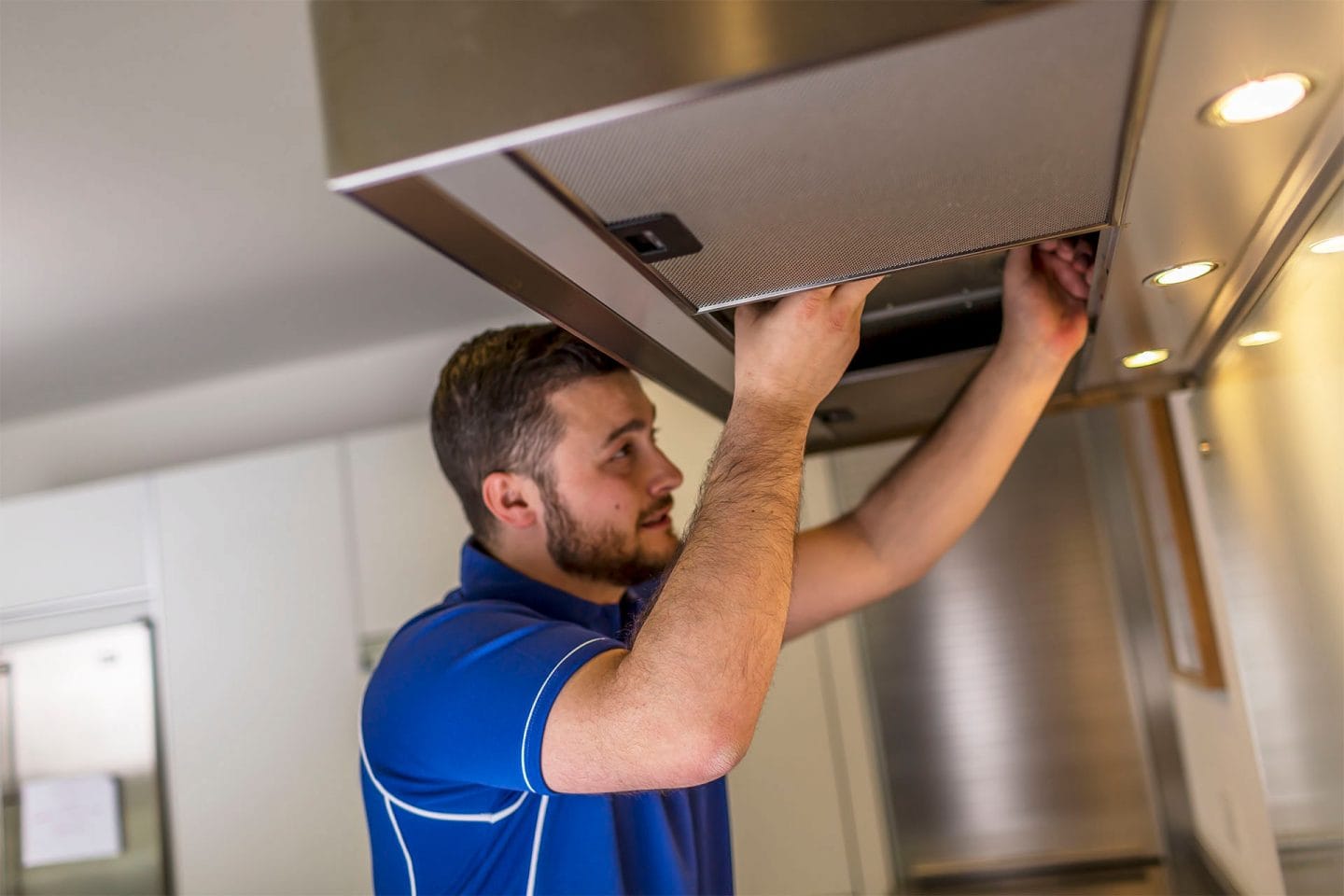 Kitchen hood installer fitting commercial canopy in Liverpool